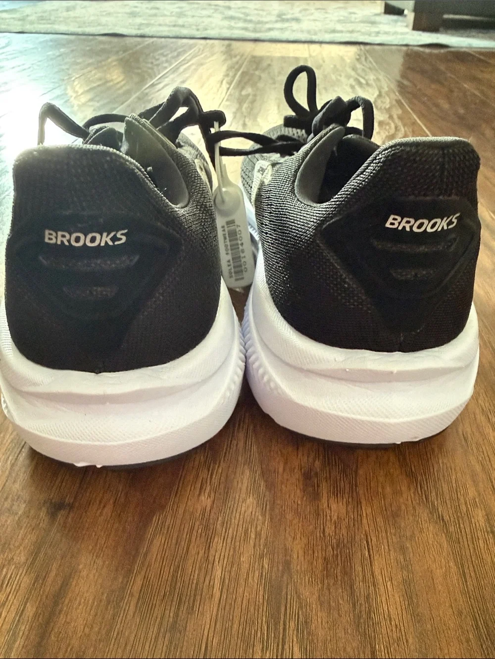 Black Athletic Running Shoes with White Midsole